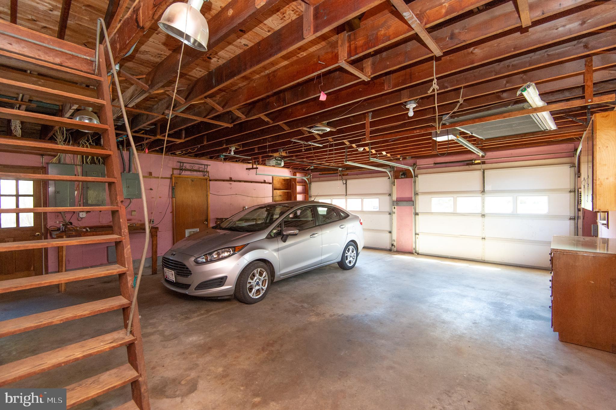 5452 Tates Bank Road Cambridge, MD 21613 - Photo 43 of 64 Garage with access to storage above