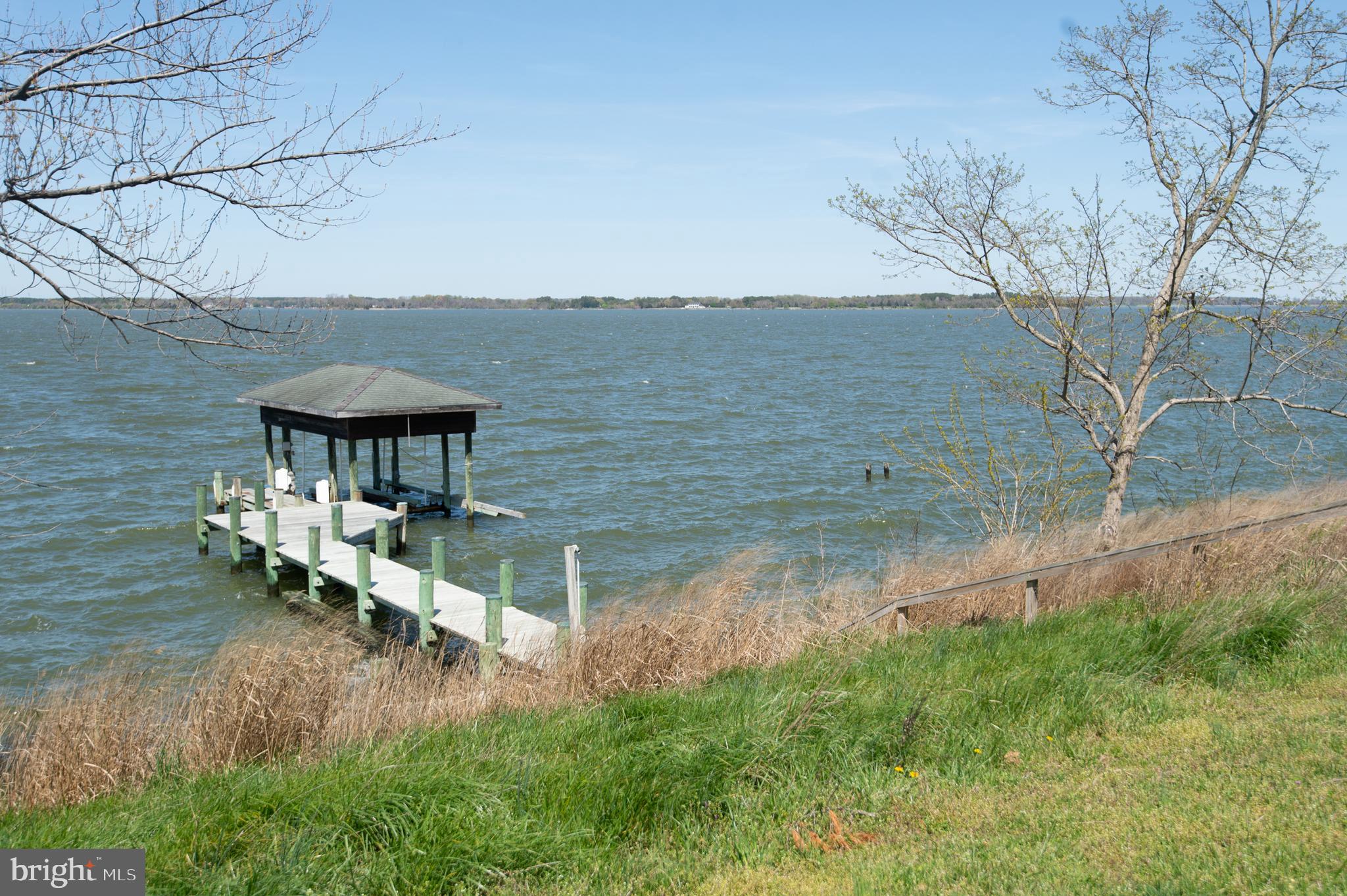 5452 Tates Bank Road Cambridge, MD 21613 - Photo 56 of 64 Pier with covered lift