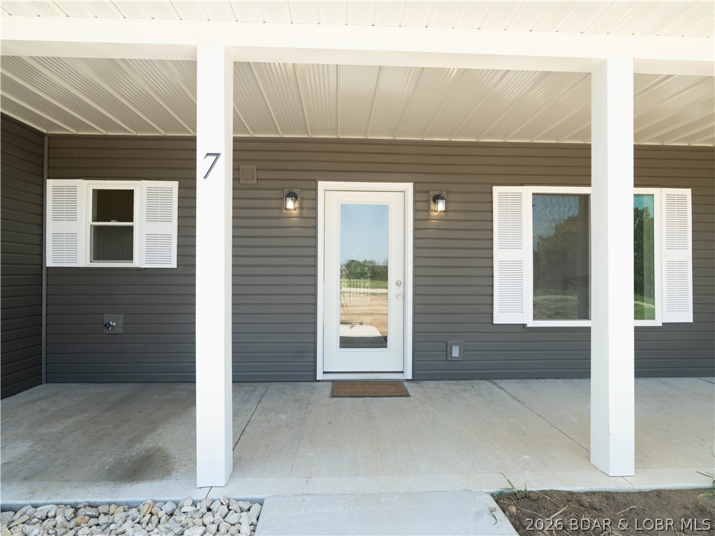 7 Oak Tree Lane Eldon, MO 65026 - Photo 43 of 59 Covered porch