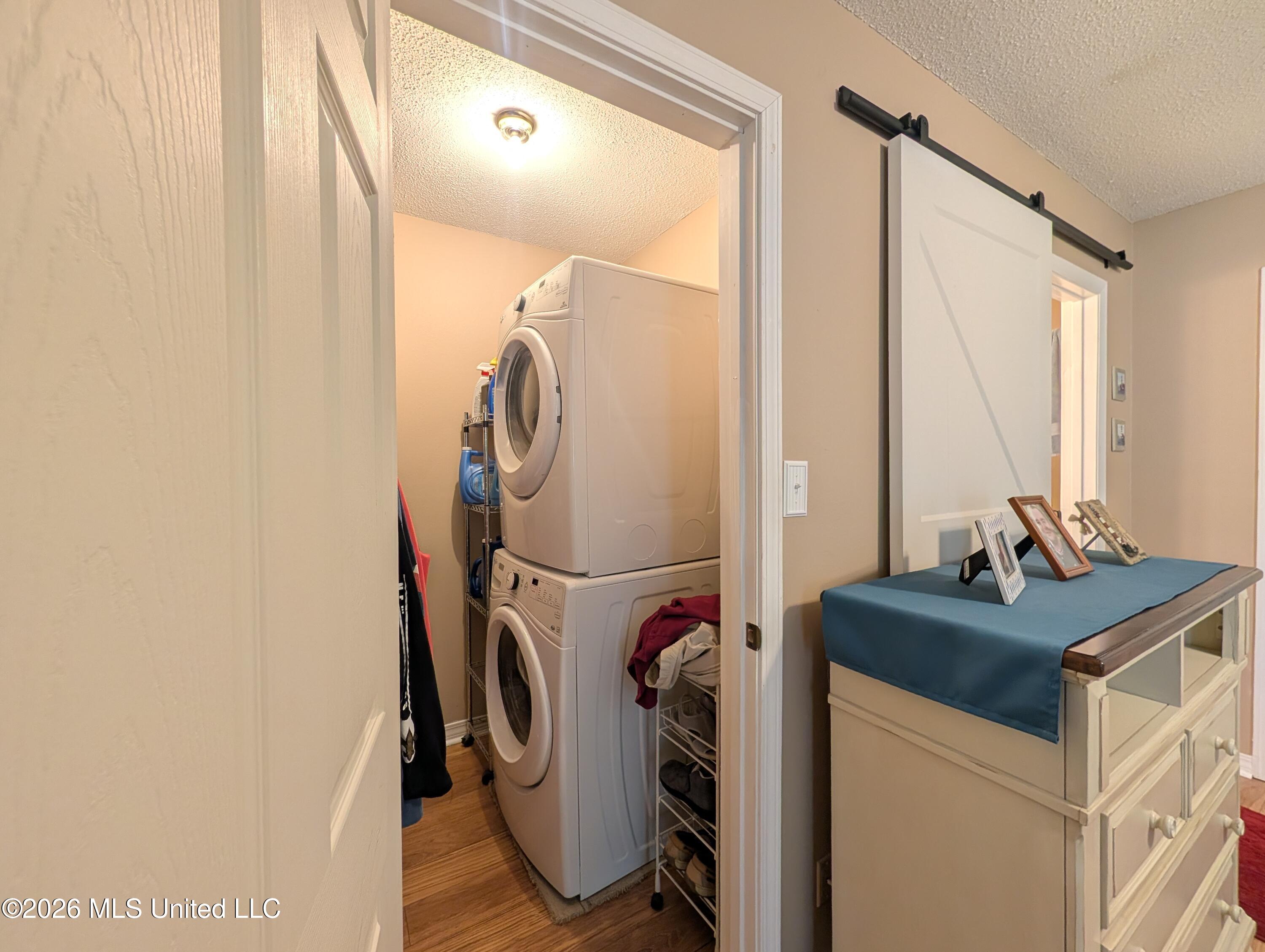 258 Highpoint Drive Diamondhead, MS 39525 - Photo 15 of 27 258 HP Upstair Laundry