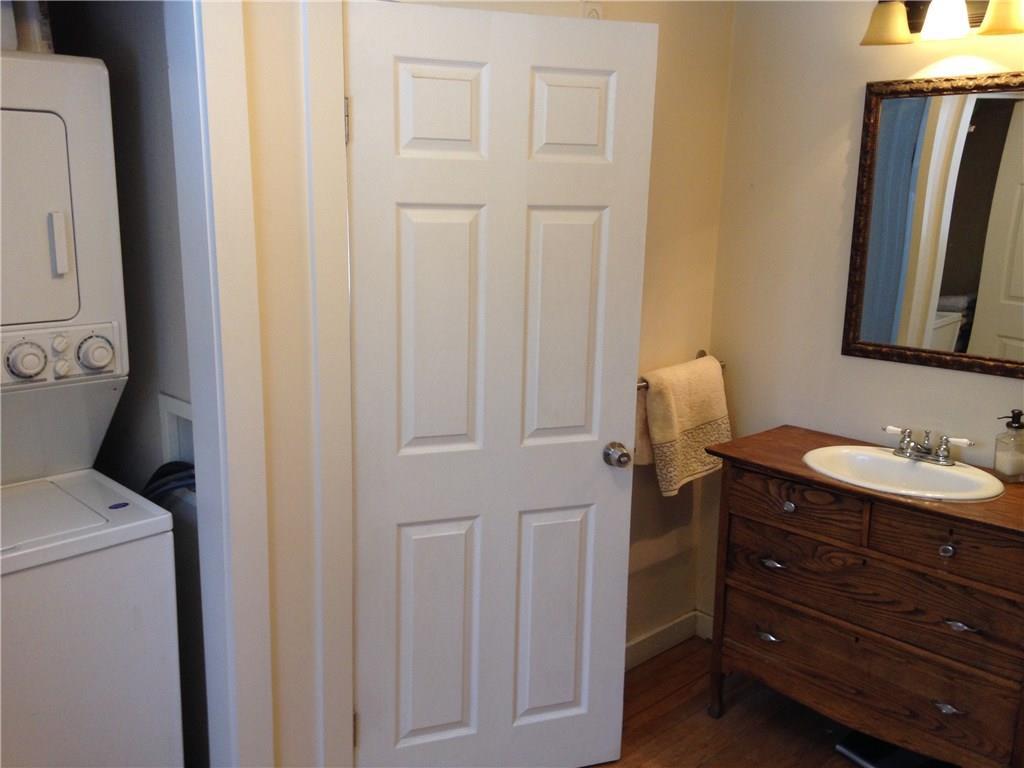 669 Ossipee Trail Limington, ME 04049 - Photo 16 of 31 First level bathroom with closet...