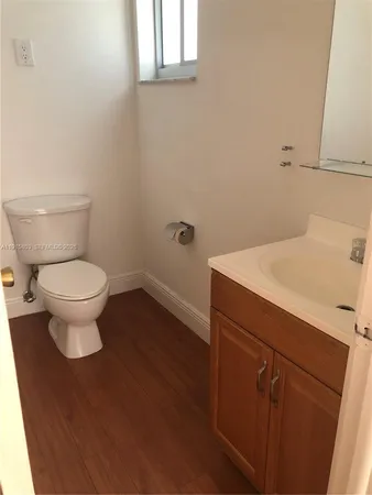a bathroom with a sink and a toilet