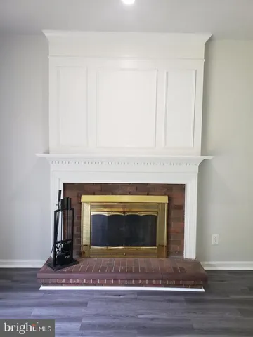 a living room with a fireplace