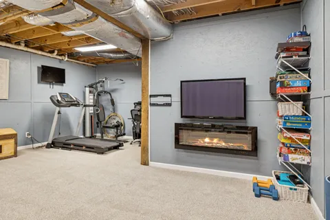 a view of a room with gym equipment