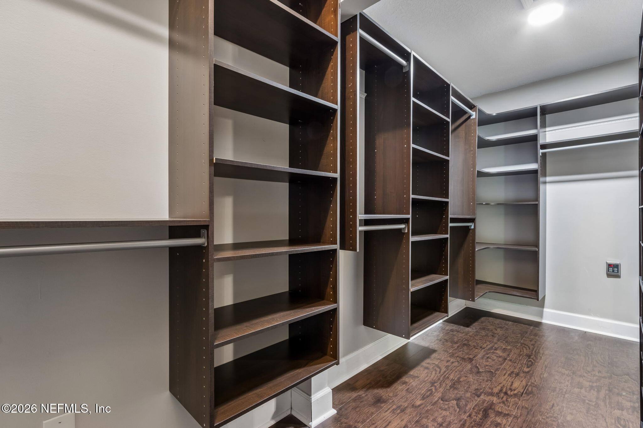 1877 Christopher Point Road South Jacksonville, FL 32217 - Photo 11 of 27 a view of walk in closet with empty racks