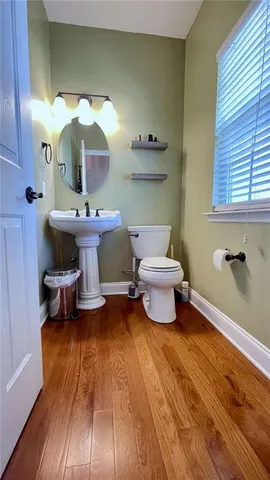 a living room with furniture flat screen tv and a fireplace