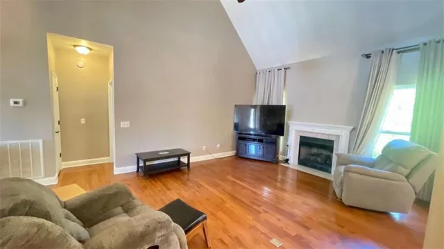 a kitchen with a stove a sink and a refrigerator