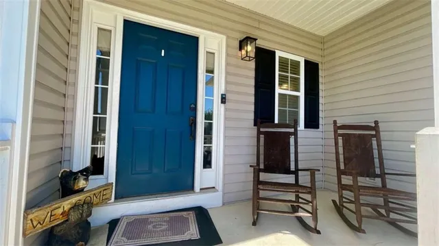 a view of a livingroom with wooden floor