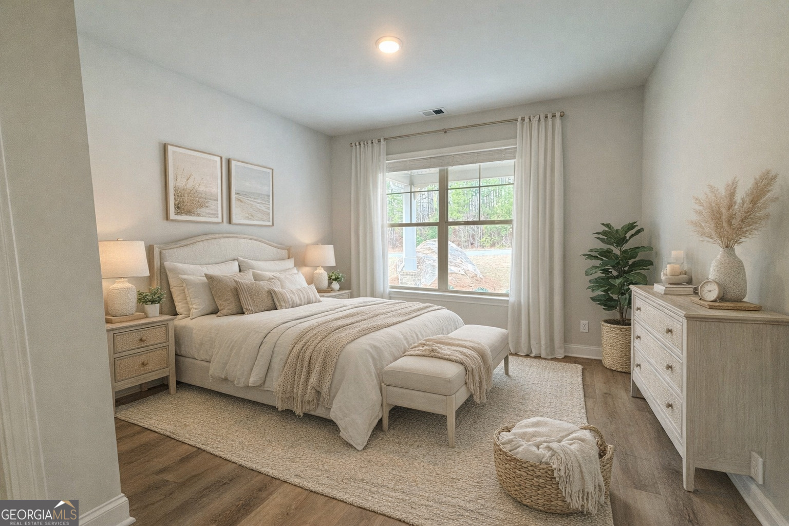 1023 Boulder Drive Gray, GA 31032 - Photo 11 of 52 a bedroom with bed and a potted plant