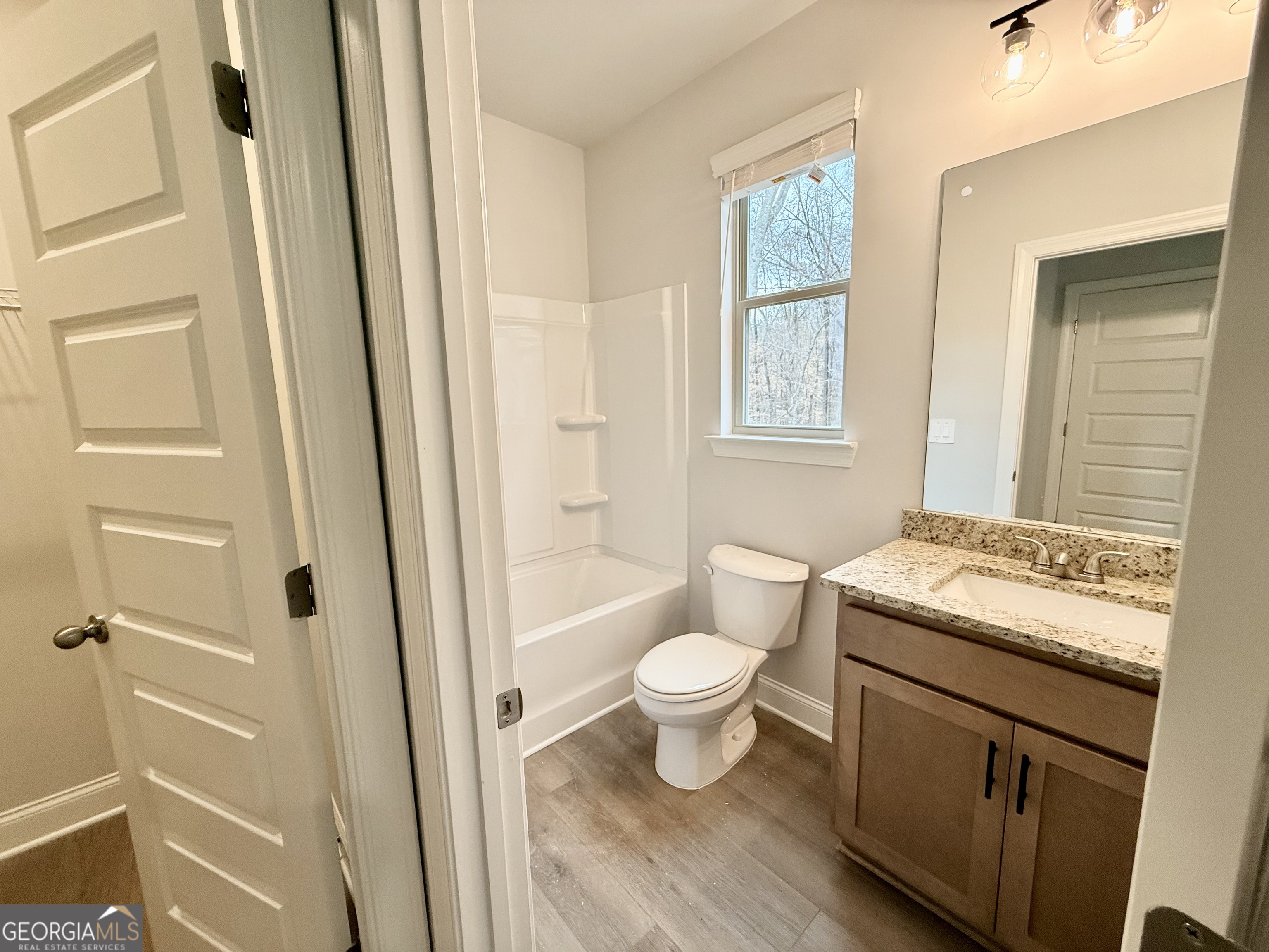 1023 Boulder Drive Gray, GA 31032 - Photo 13 of 52 a bathroom with a sink toilet and shower