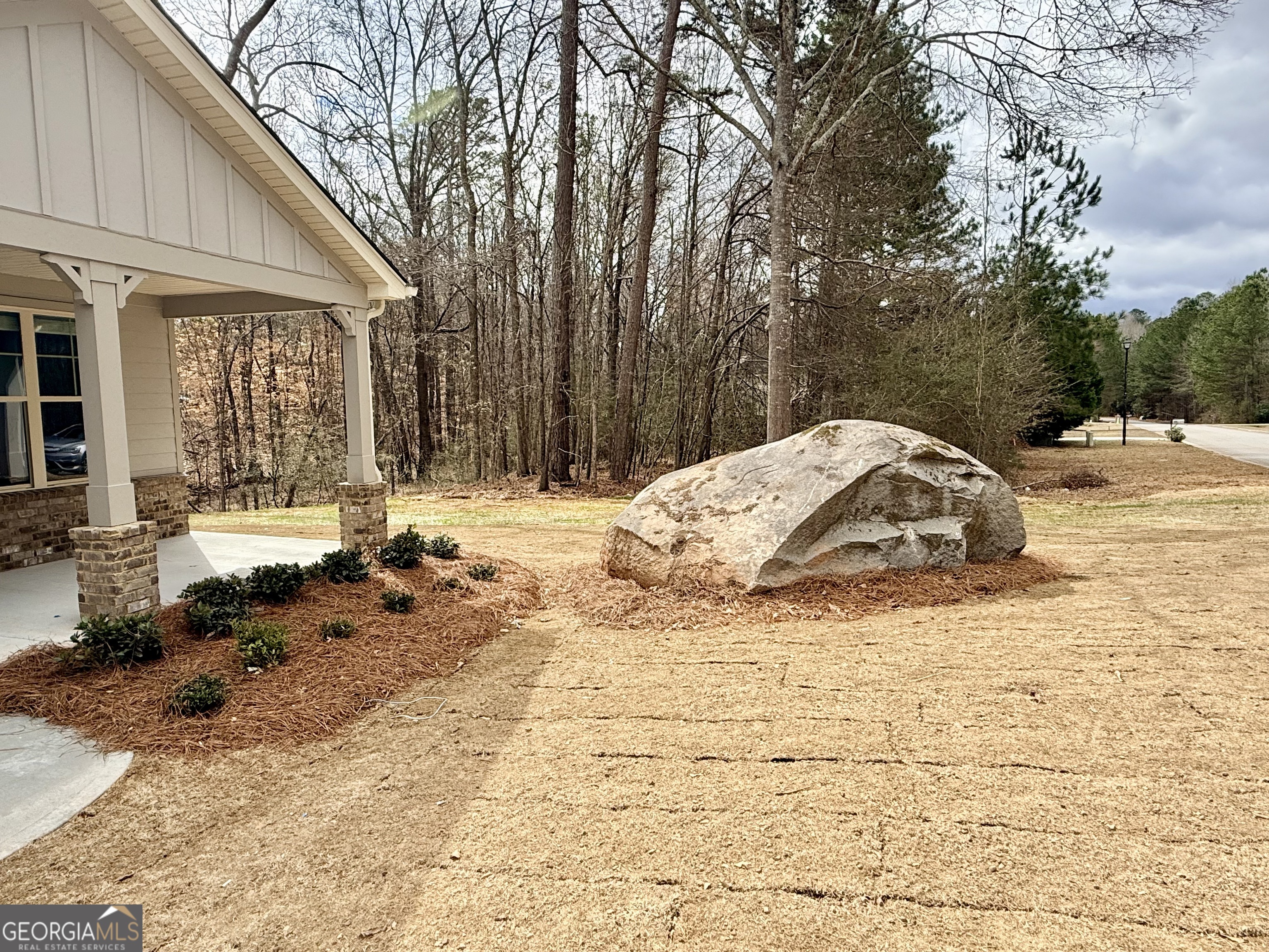 1023 Boulder Drive Gray, GA 31032 - Photo 2 of 52 a view of a house with snow on the ground