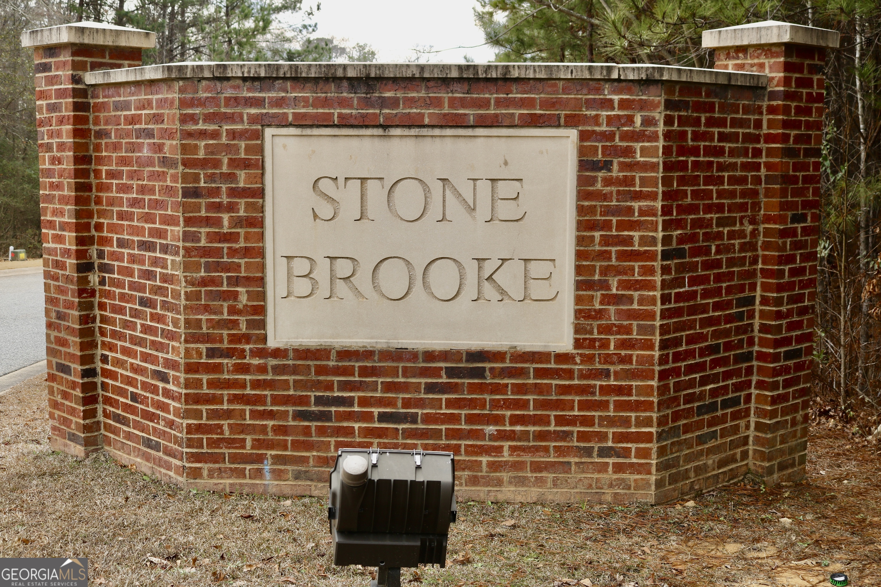 1023 Boulder Drive Gray, GA 31032 - Photo 52 of 52 a brick building with a street sign on it