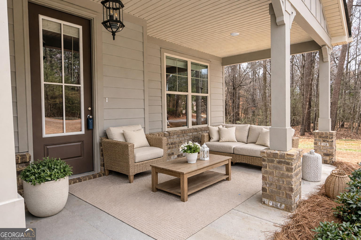 1023 Boulder Drive Gray, GA 31032 - Photo 6 of 52 a view of a patio with couches and a potted plant
