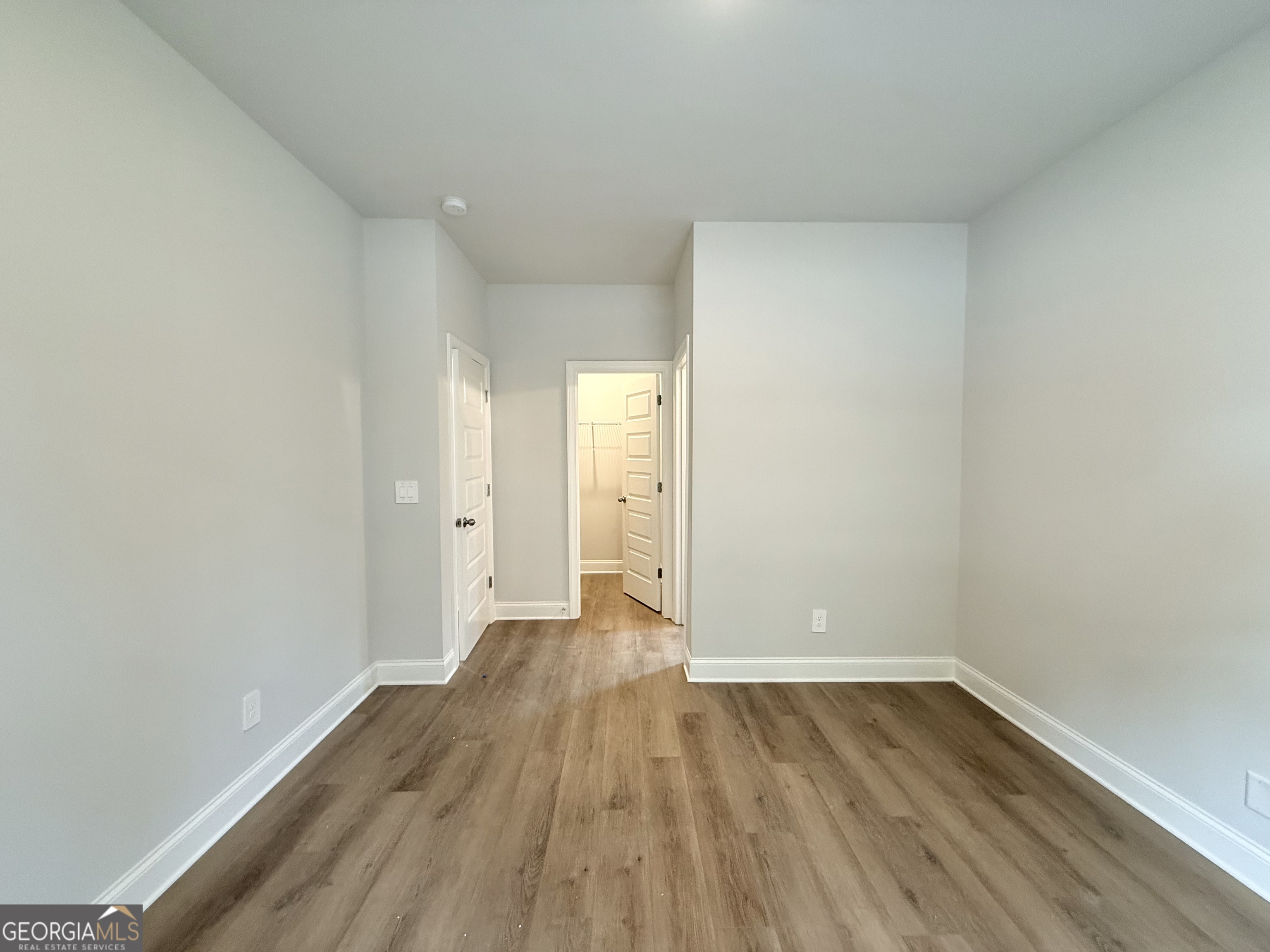 1023 Boulder Drive Gray, GA 31032 - Photo 10 of 52 a view of an empty room and wooden floor