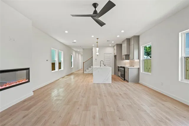 a view of kitchen with stainless steel appliances refrigerator oven and stove