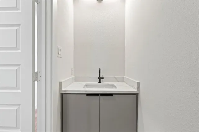 a sink with a mirror