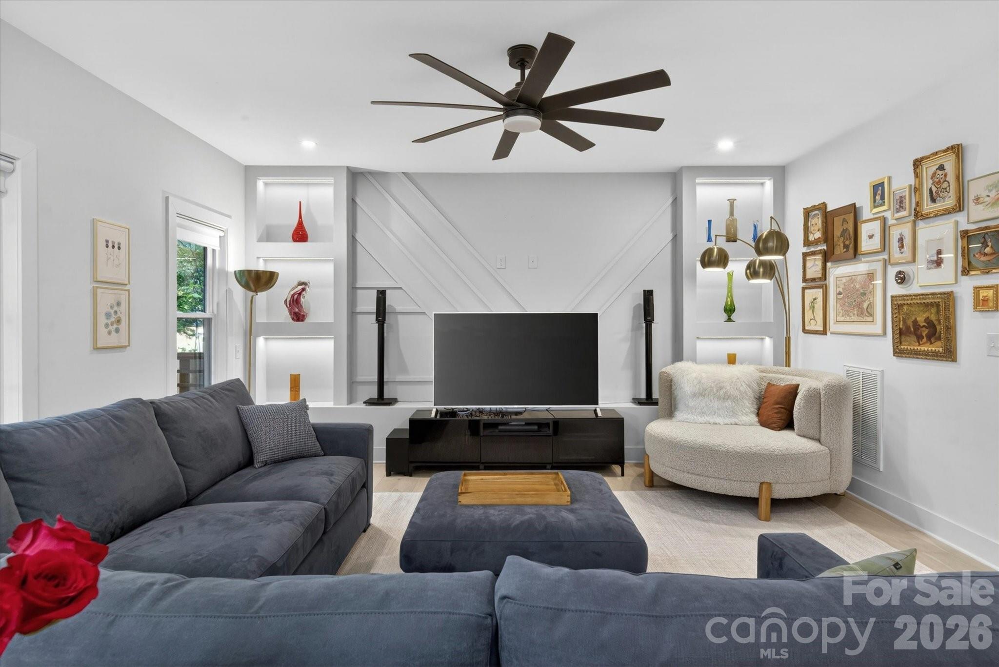 1608 Chippendale Road Charlotte, NC 28205 - Photo 17 of 46 a living room with furniture and a flat screen tv