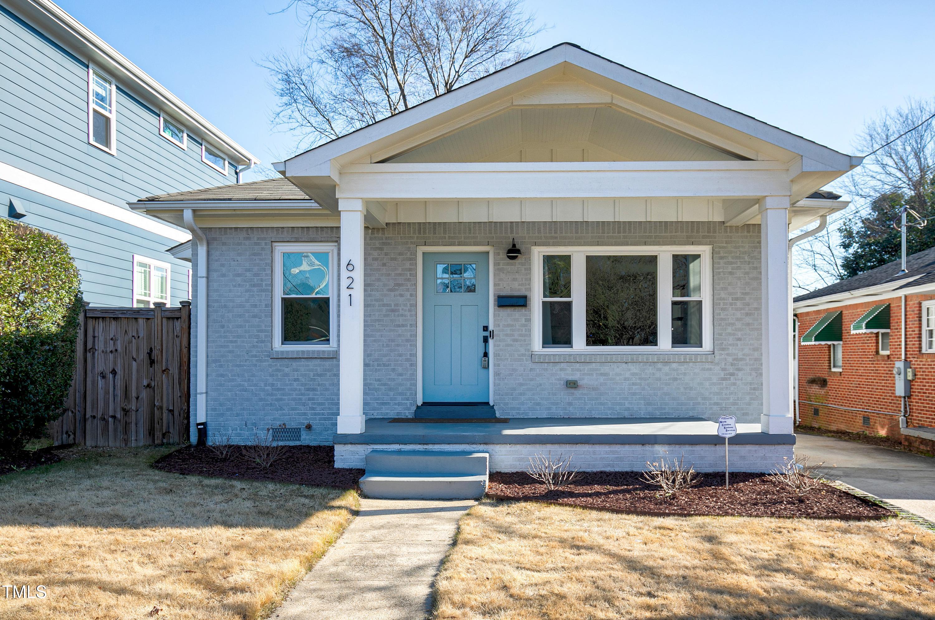 621 Coleman Street Raleigh, NC 27610 - Photo 1 of 42 a front view of a house with a yard