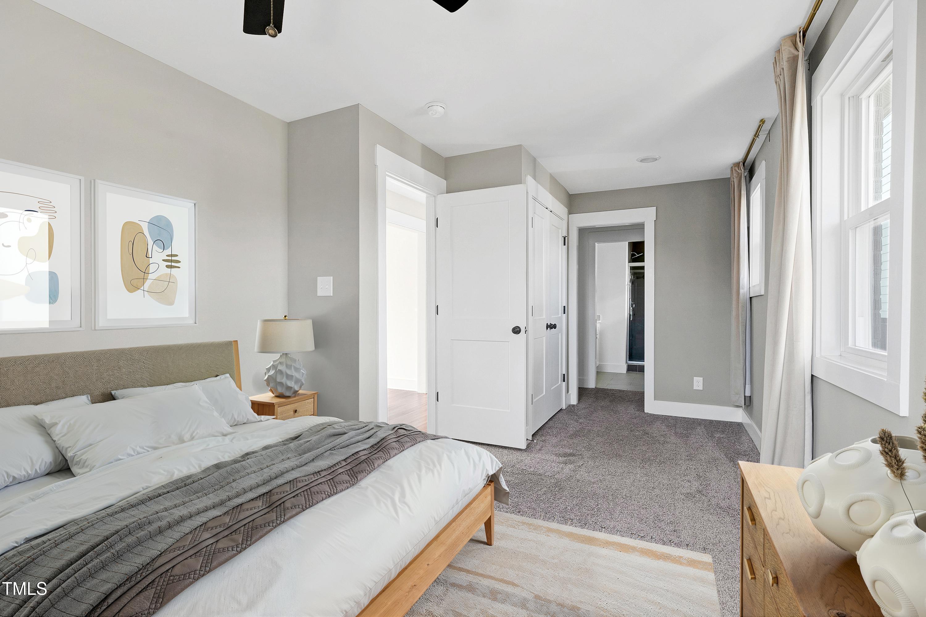 621 Coleman Street Raleigh, NC 27610 - Photo 15 of 42 a bedroom with a bed and a window