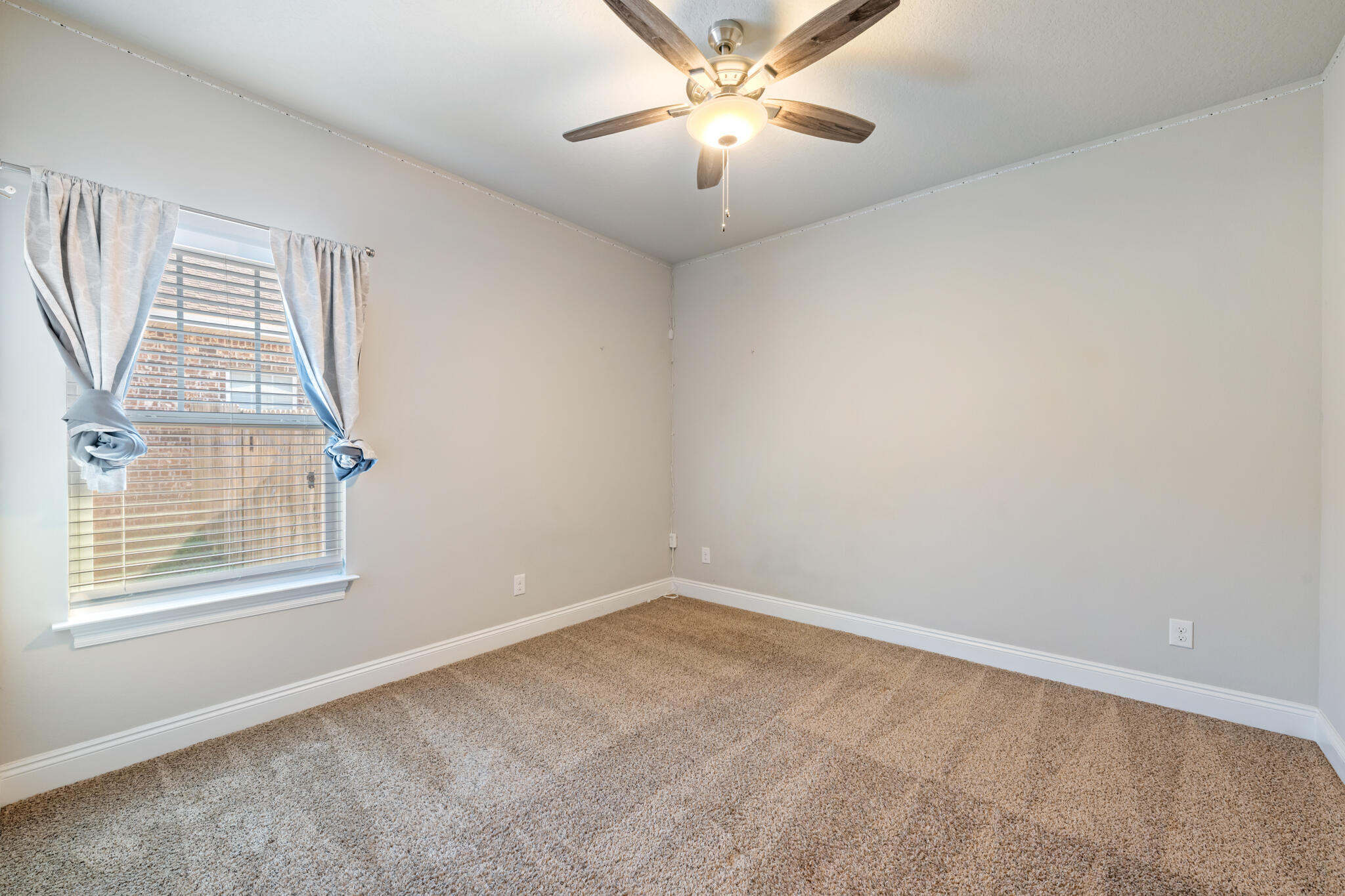 7287 Gordon Evans Road Navarre, FL 32566 - Photo 31 of 45 a view of an empty room with a window