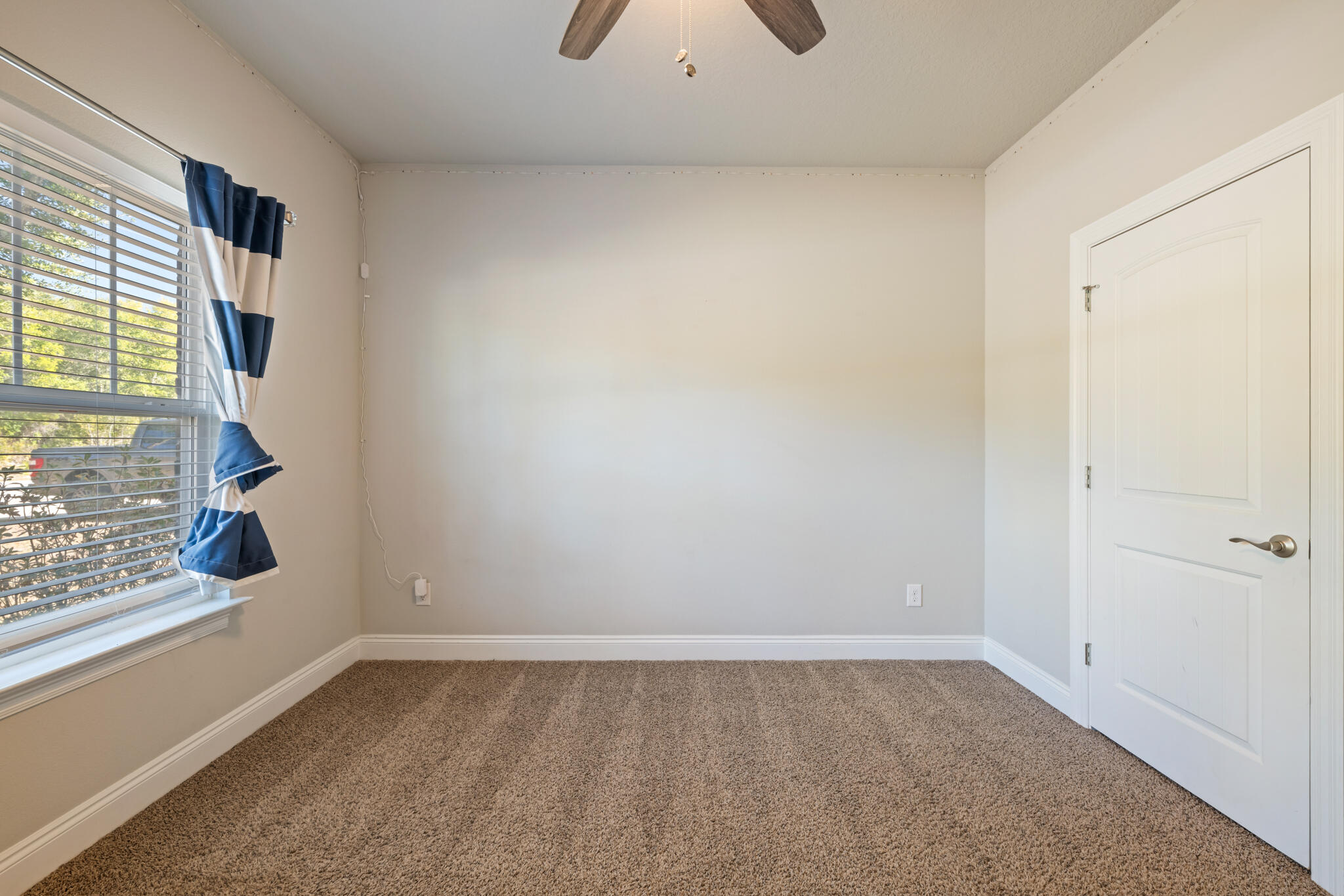 7287 Gordon Evans Road Navarre, FL 32566 - Photo 36 of 45 a view of an empty room with a window