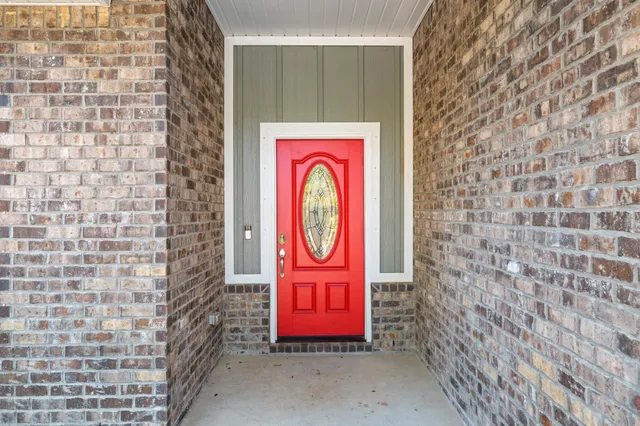 a view of door with wooden door