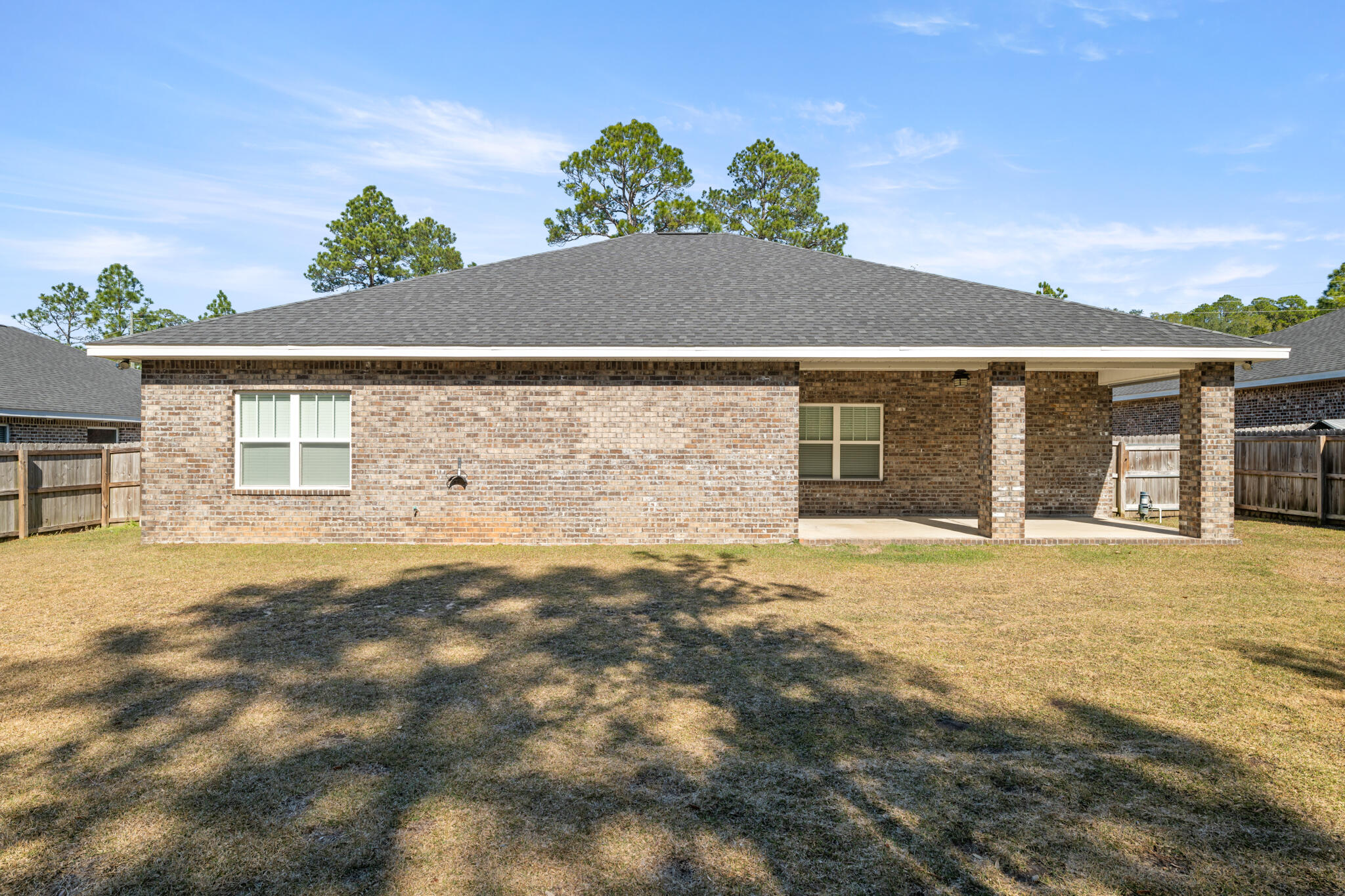 7287 Gordon Evans Road Navarre, FL 32566 - Photo 41 of 45 front view of a house with a yard
