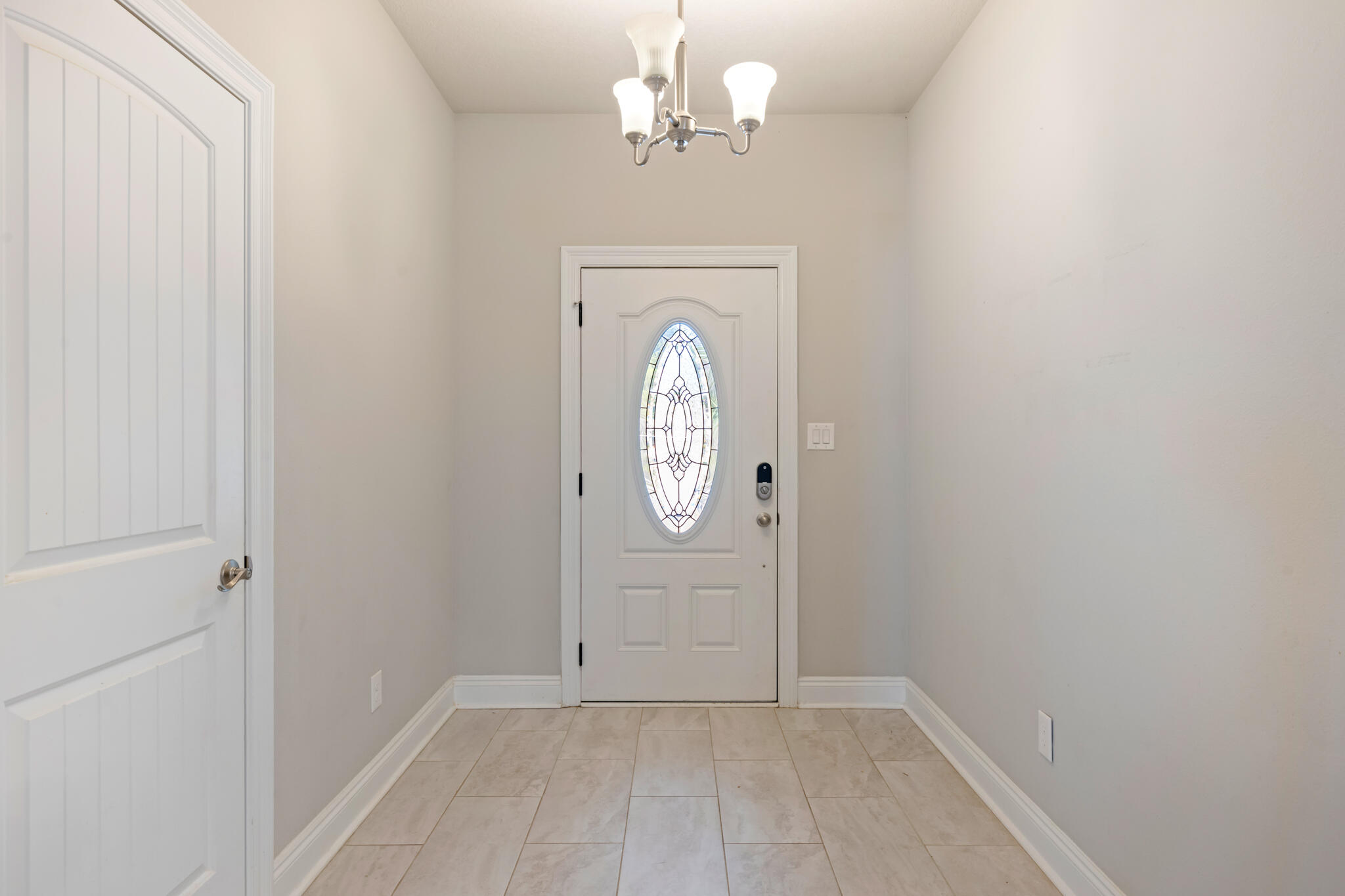 7287 Gordon Evans Road Navarre, FL 32566 - Photo 5 of 45 a view of entryway with hallway