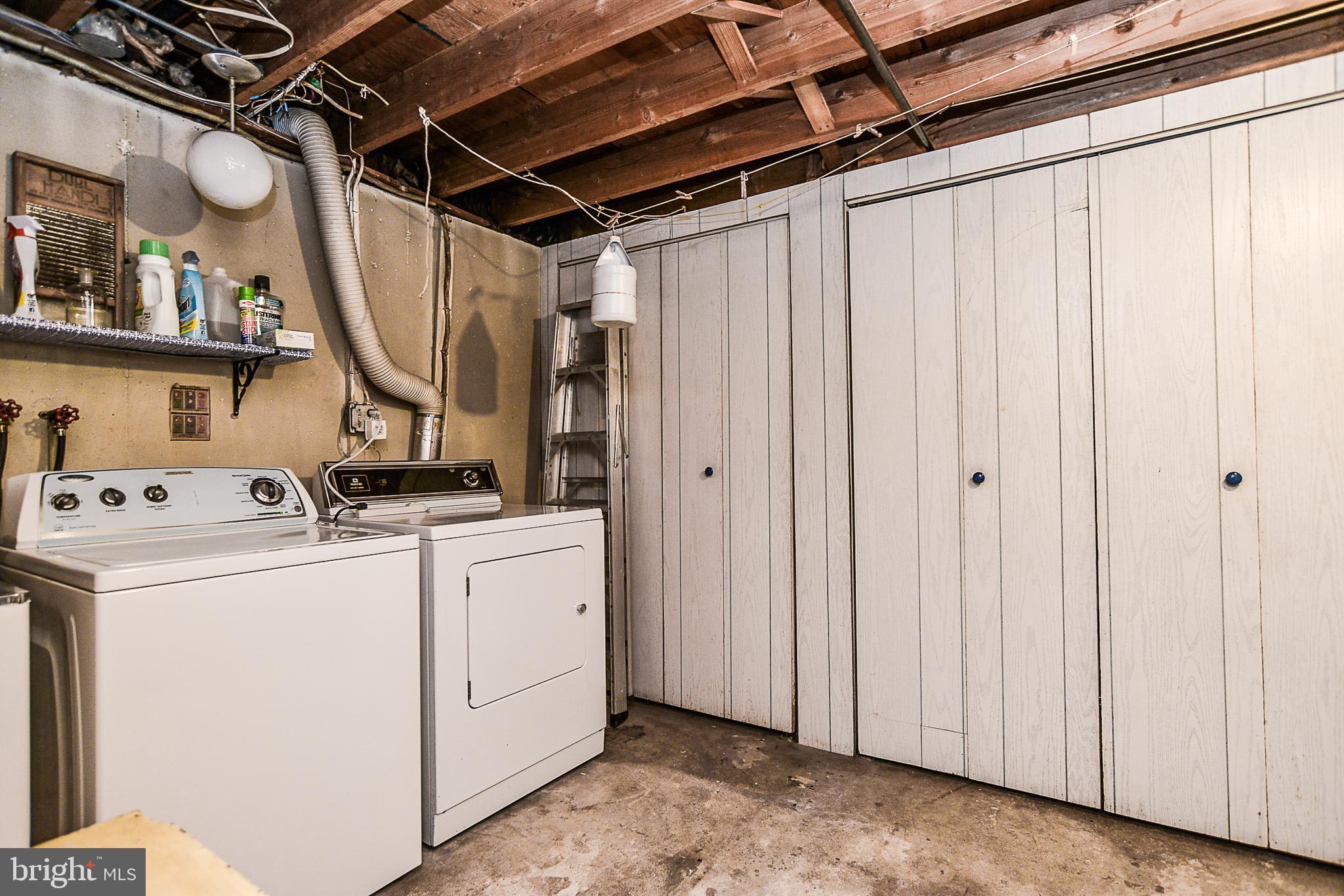 8605 Briarcroft Lane Laurel, MD 20708 - Photo 28 of 38 Laundry area and additional built-in storage.