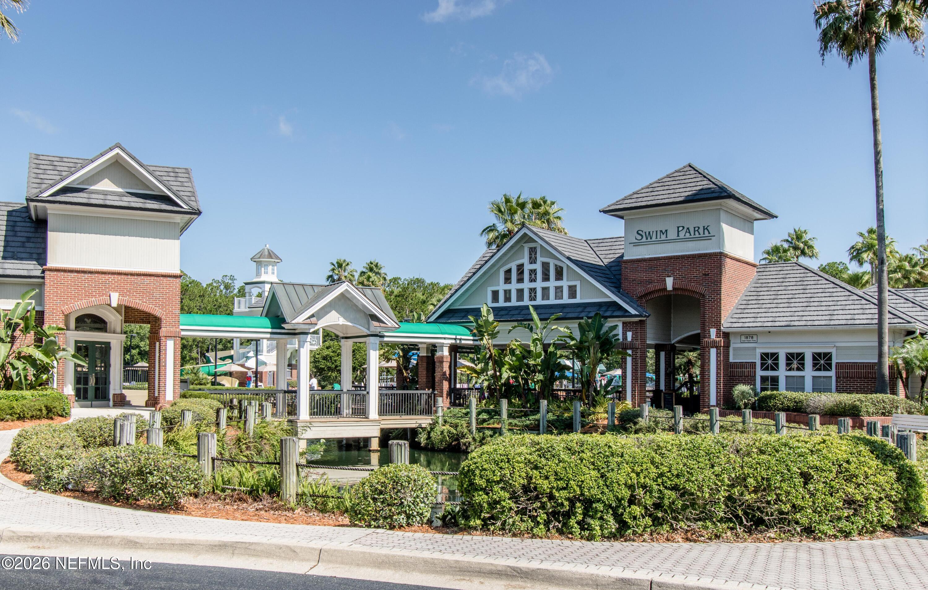 2035 Secret Garden Lane, Unit 505 Fleming Island, FL 32003 - Photo 36 of 47 a front view of house with yard