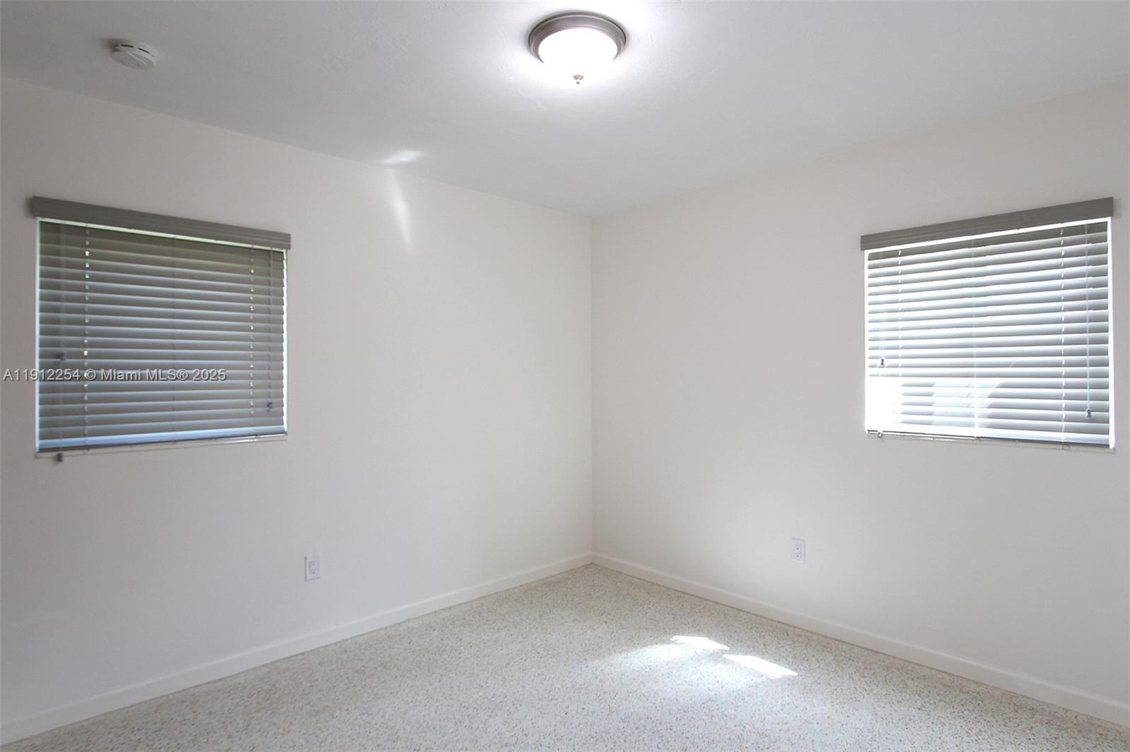 6203 Southwest 108th Place Miami, FL 33173 - Photo 14 of 23 an empty room with a window