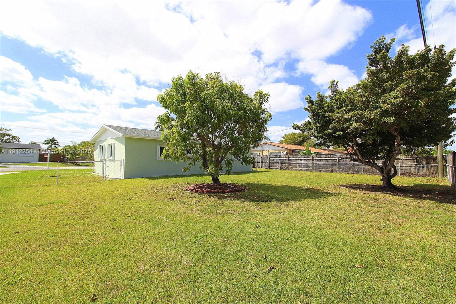 6203 Southwest 108th Place Miami, FL 33173 - Photo 19 of 23 a view of swimming pool with an outdoor space and seating area