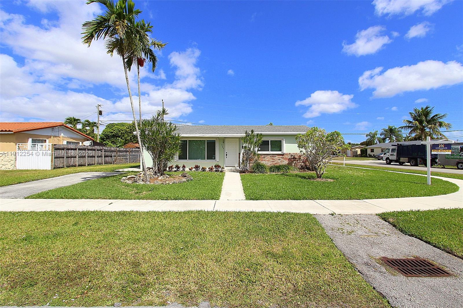 6203 Southwest 108th Place Miami, FL 33173 - Photo 22 of 23 a view of a house with a swimming pool