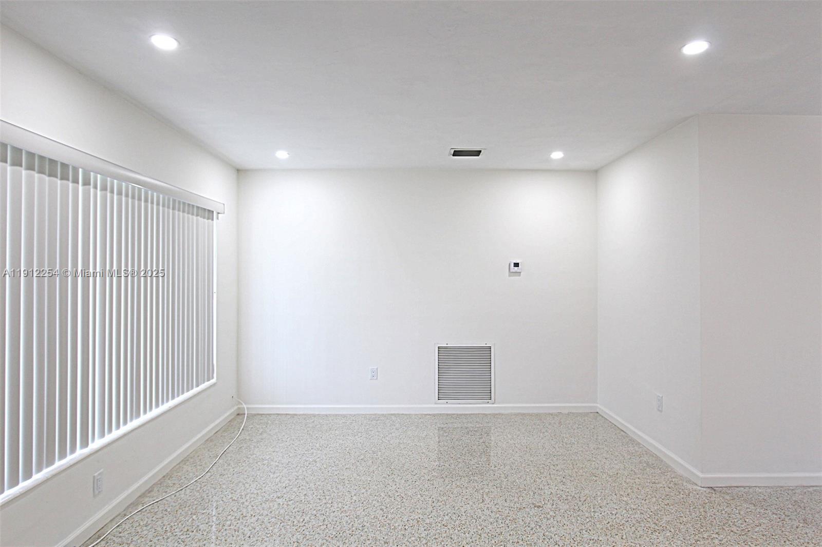 6203 Southwest 108th Place Miami, FL 33173 - Photo 8 of 23 a view of an empty room