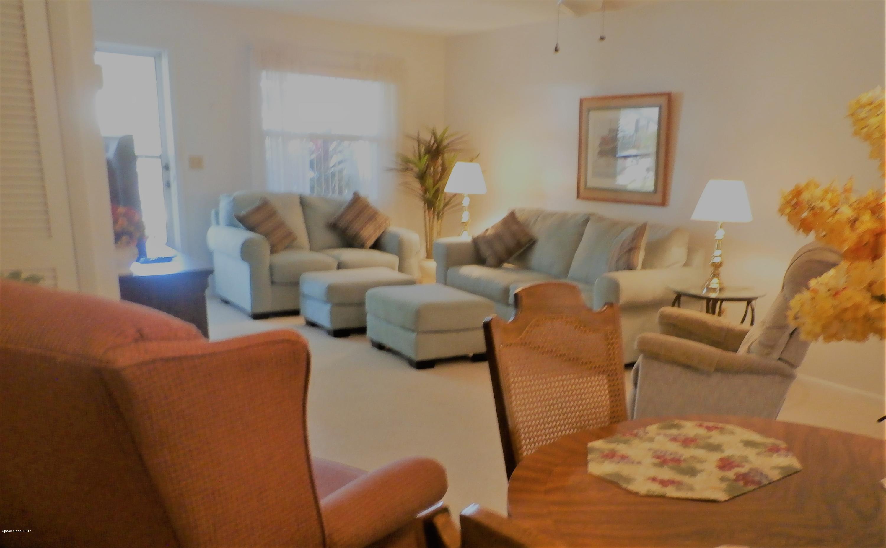 538 Trend Road West Melbourne, FL 32904 - Photo 2 of 16 a living room with furniture and a couch