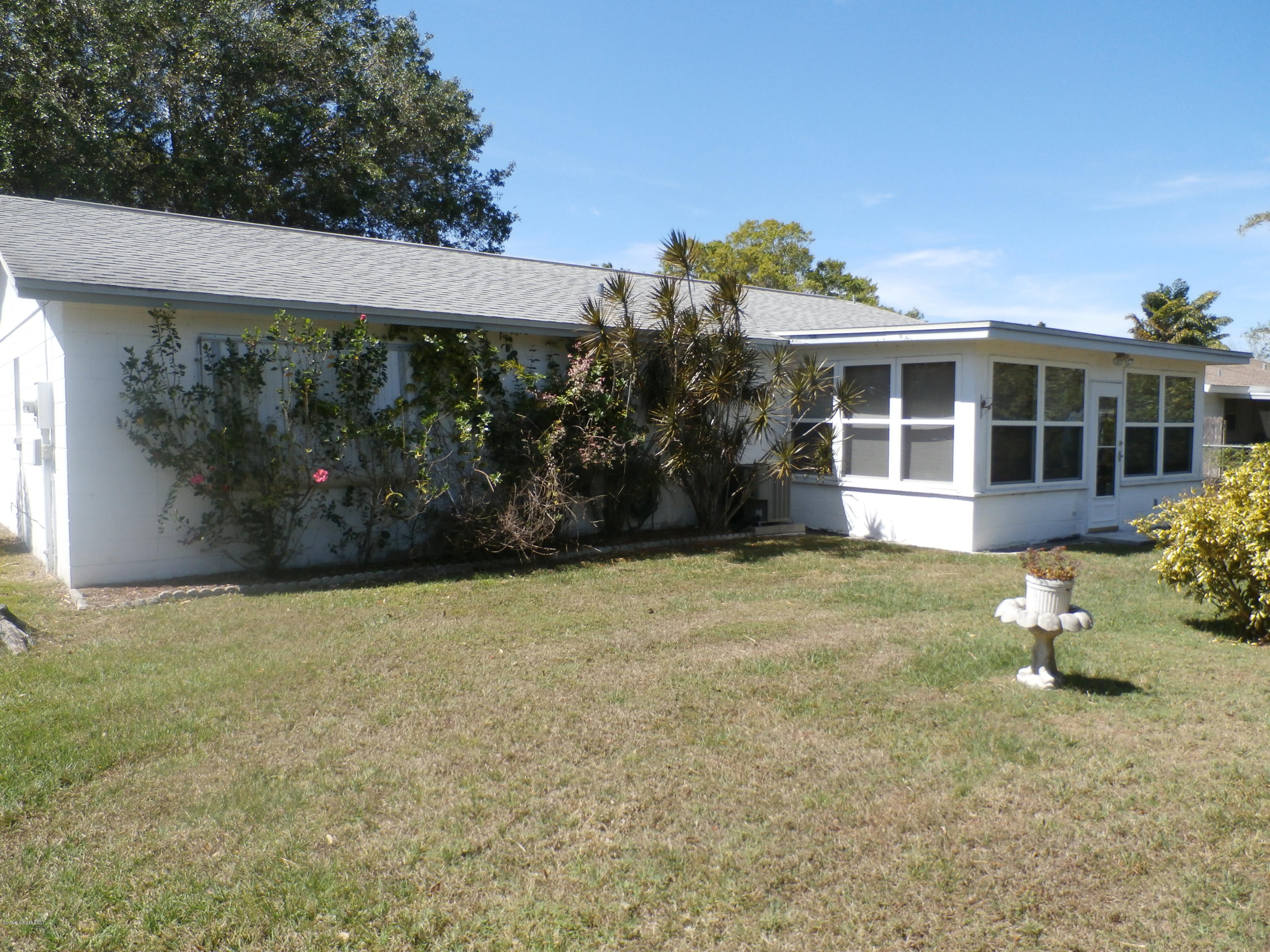 538 Trend Road West Melbourne, FL 32904 - Photo 16 of 16 a view of a house with backyard and garden