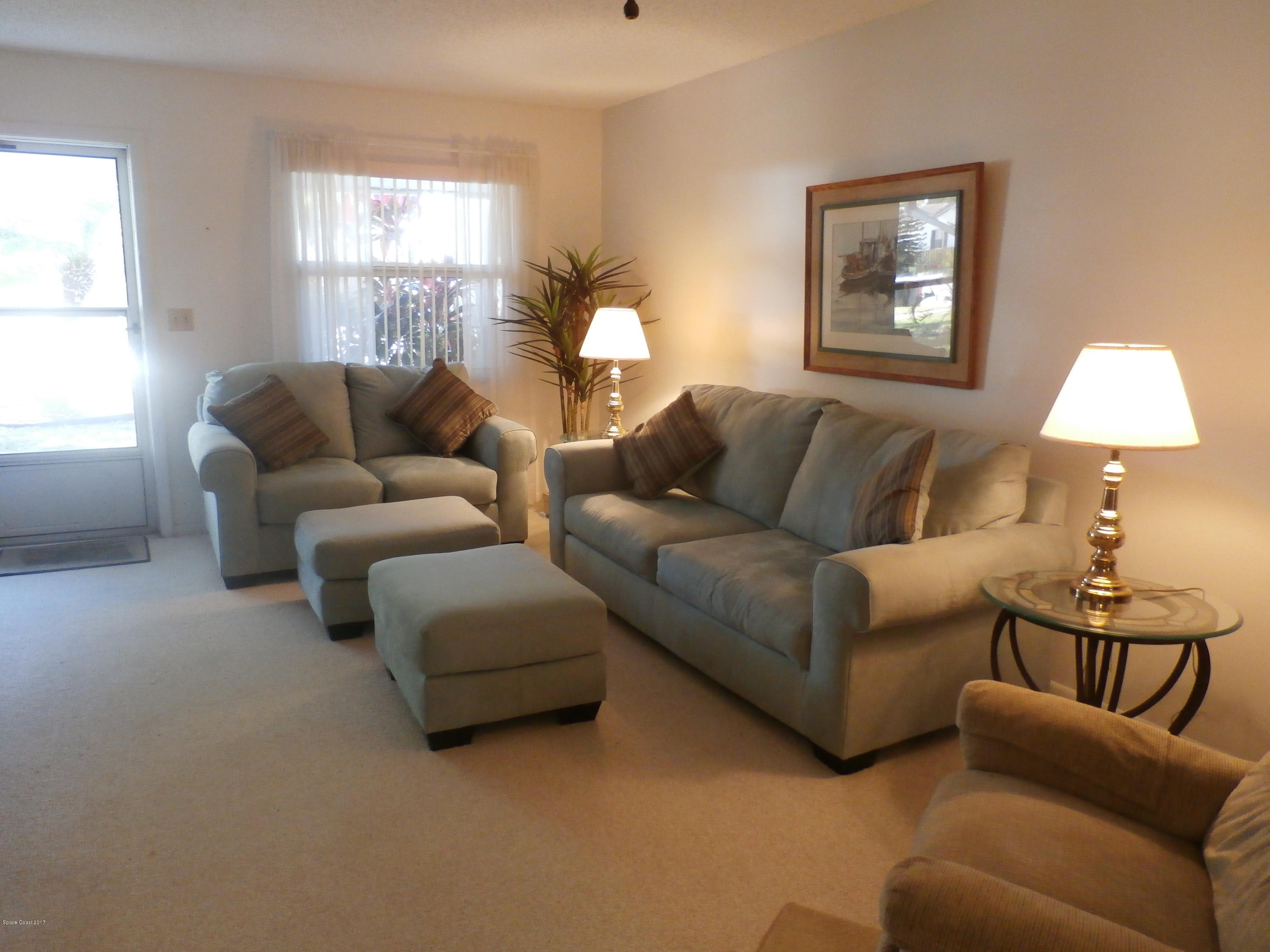 538 Trend Road West Melbourne, FL 32904 - Photo 4 of 16 a living room with furniture and a window