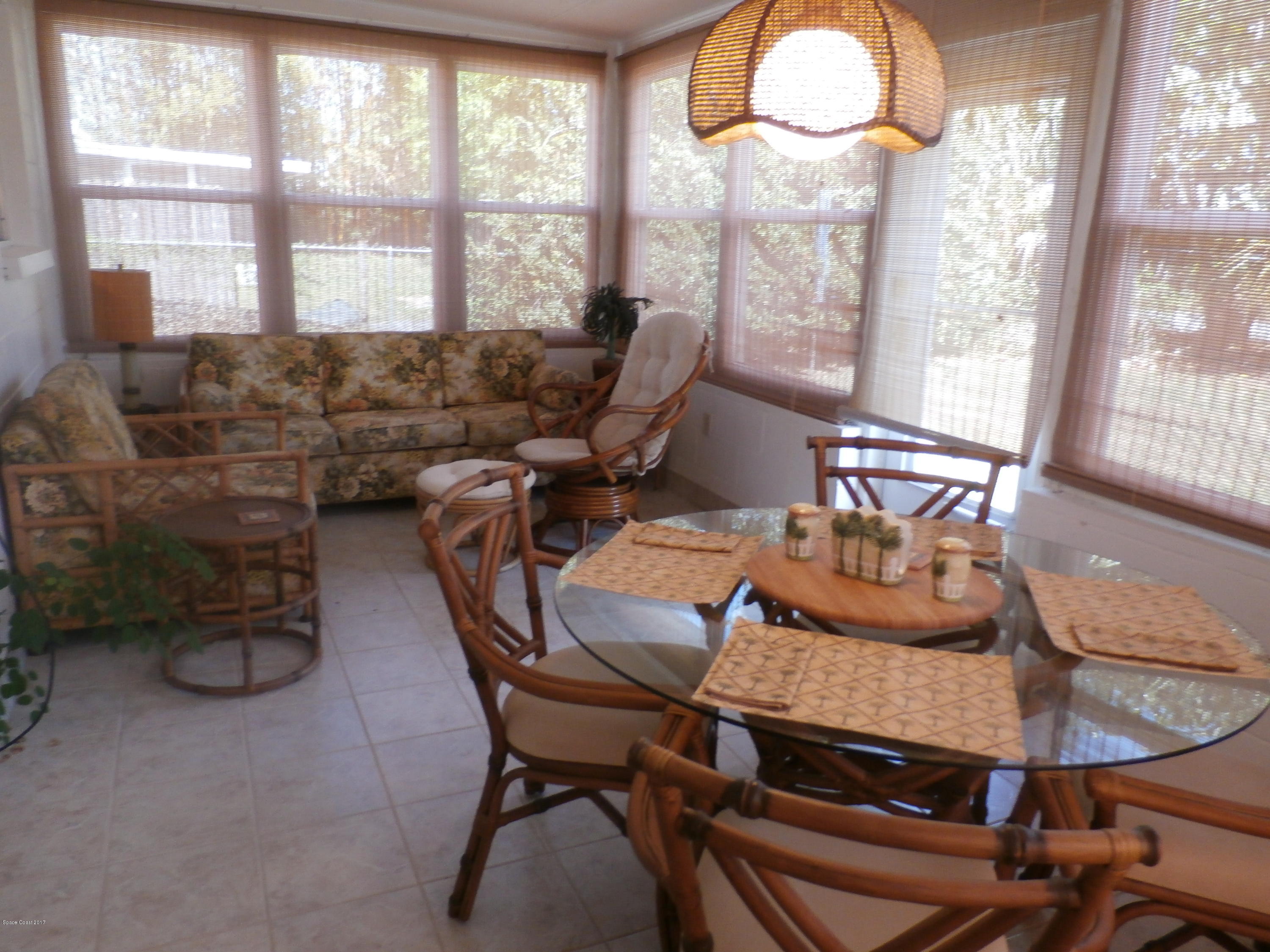 538 Trend Road West Melbourne, FL 32904 - Photo 9 of 16 a dining room with furniture and a large window