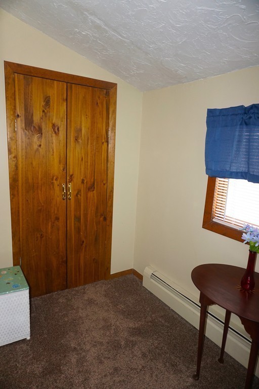 28 Lennon Street Gardner, MA 01440 - Photo 11 of 30 a view of a room with a wooden door