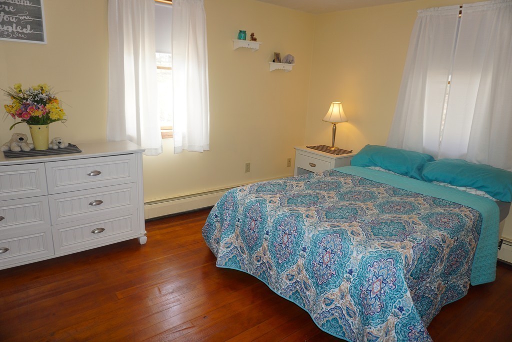 28 Lennon Street Gardner, MA 01440 - Photo 14 of 30 a bedroom with a bed and a dresser