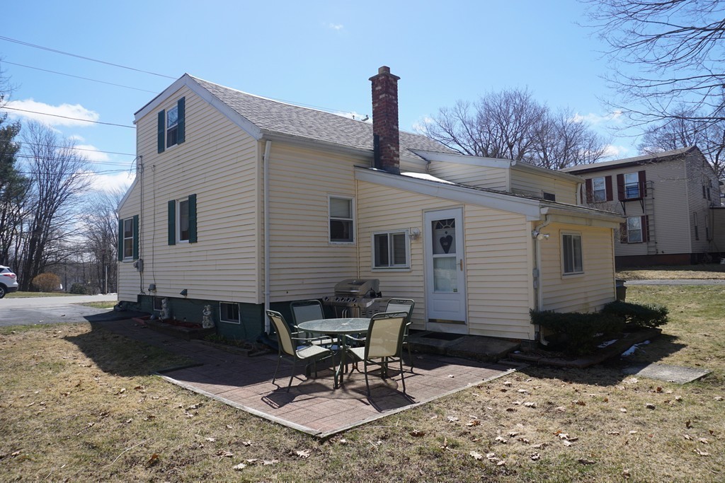 28 Lennon Street Gardner, MA 01440 - Photo 26 of 30 a view of a patio with a table and chairs
