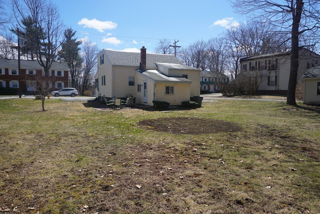 28 Lennon Street Gardner, MA 01440 - Photo 27 of 30 a view of a backyard with a white house