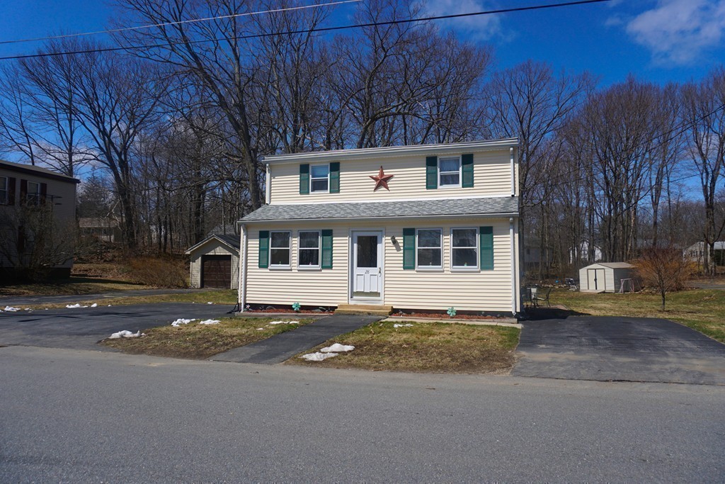 28 Lennon Street Gardner, MA 01440 - Photo 30 of 30 a front view of a house with a yard