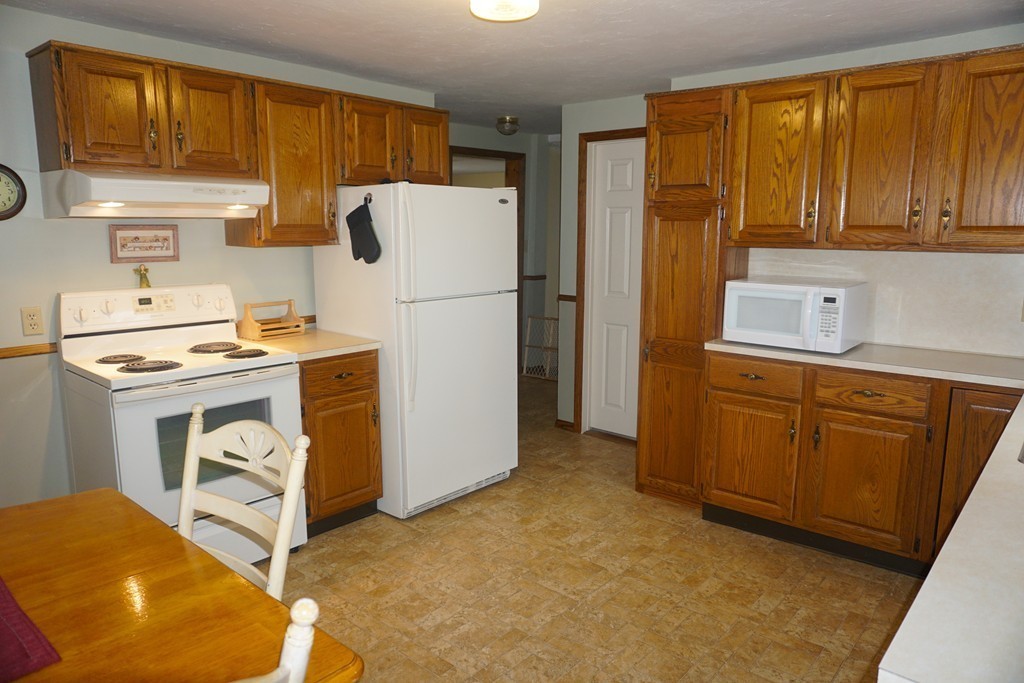 28 Lennon Street Gardner, MA 01440 - Photo 4 of 30 a room with storage and utility