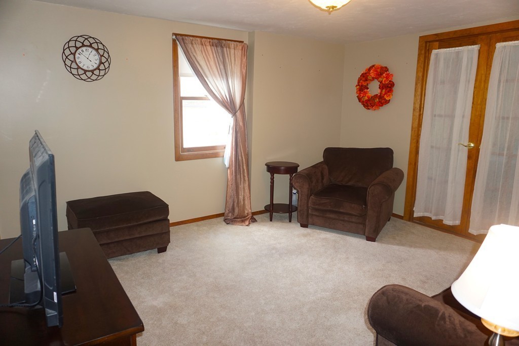 28 Lennon Street Gardner, MA 01440 - Photo 6 of 30 a living room with furniture and a window