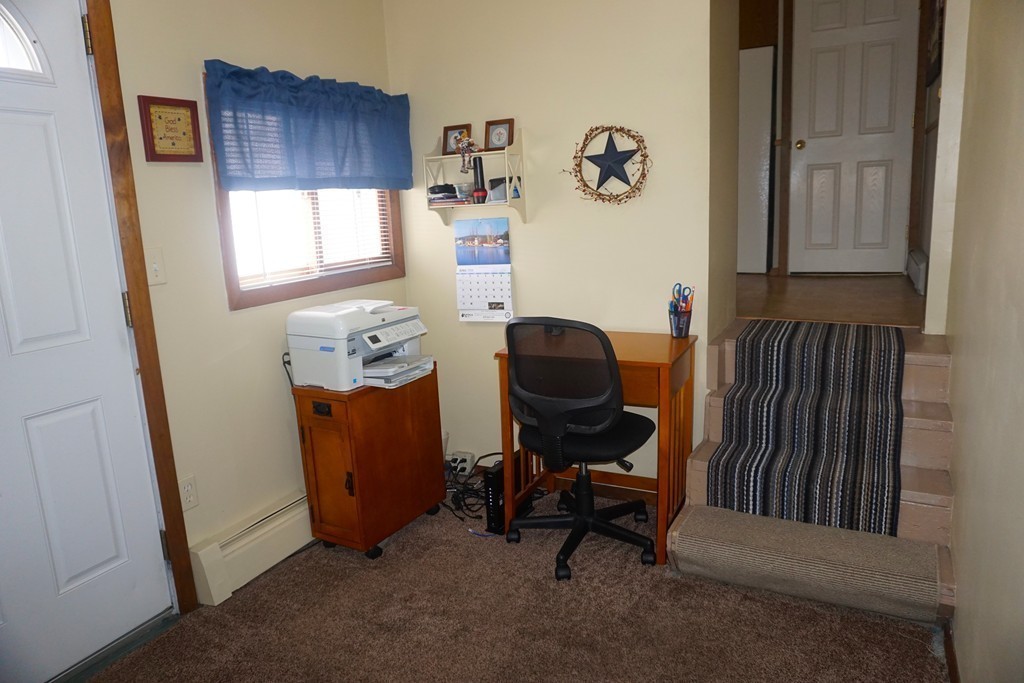 28 Lennon Street Gardner, MA 01440 - Photo 10 of 30 a room with furniture and a window