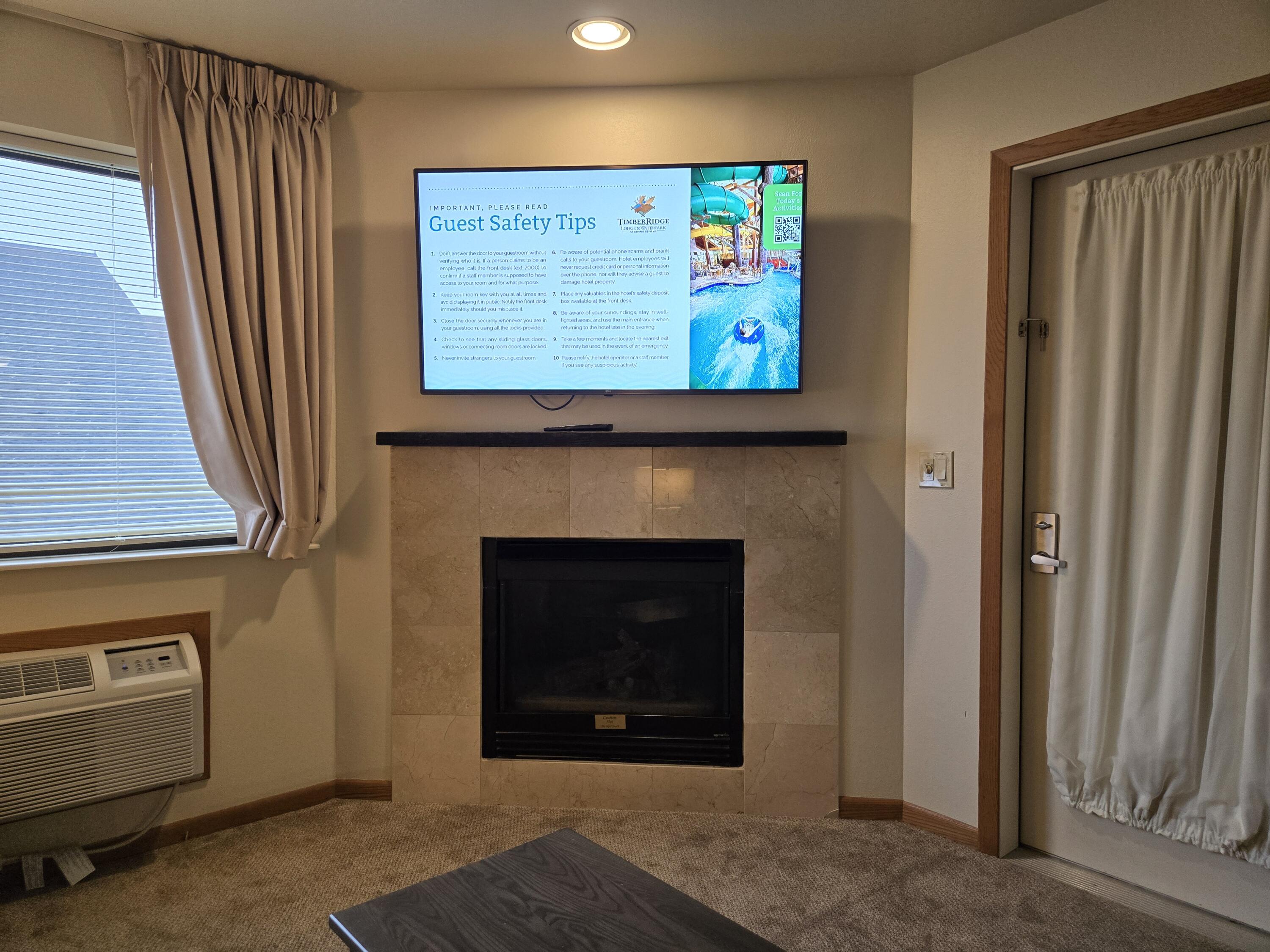 7020 Grand Geneva Way, Unit 361 Lyons, WI 53147 - Photo 19 of 29 Flat Screen TVs and Fireplace