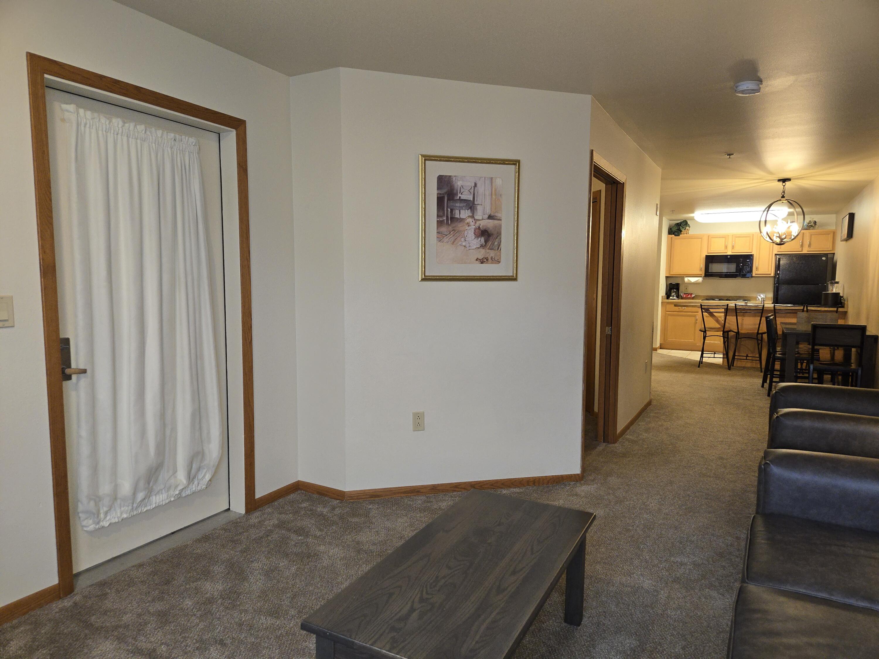 7020 Grand Geneva Way, Unit 361 Lyons, WI 53147 - Photo 27 of 29 Door leads to a Private Balcony
