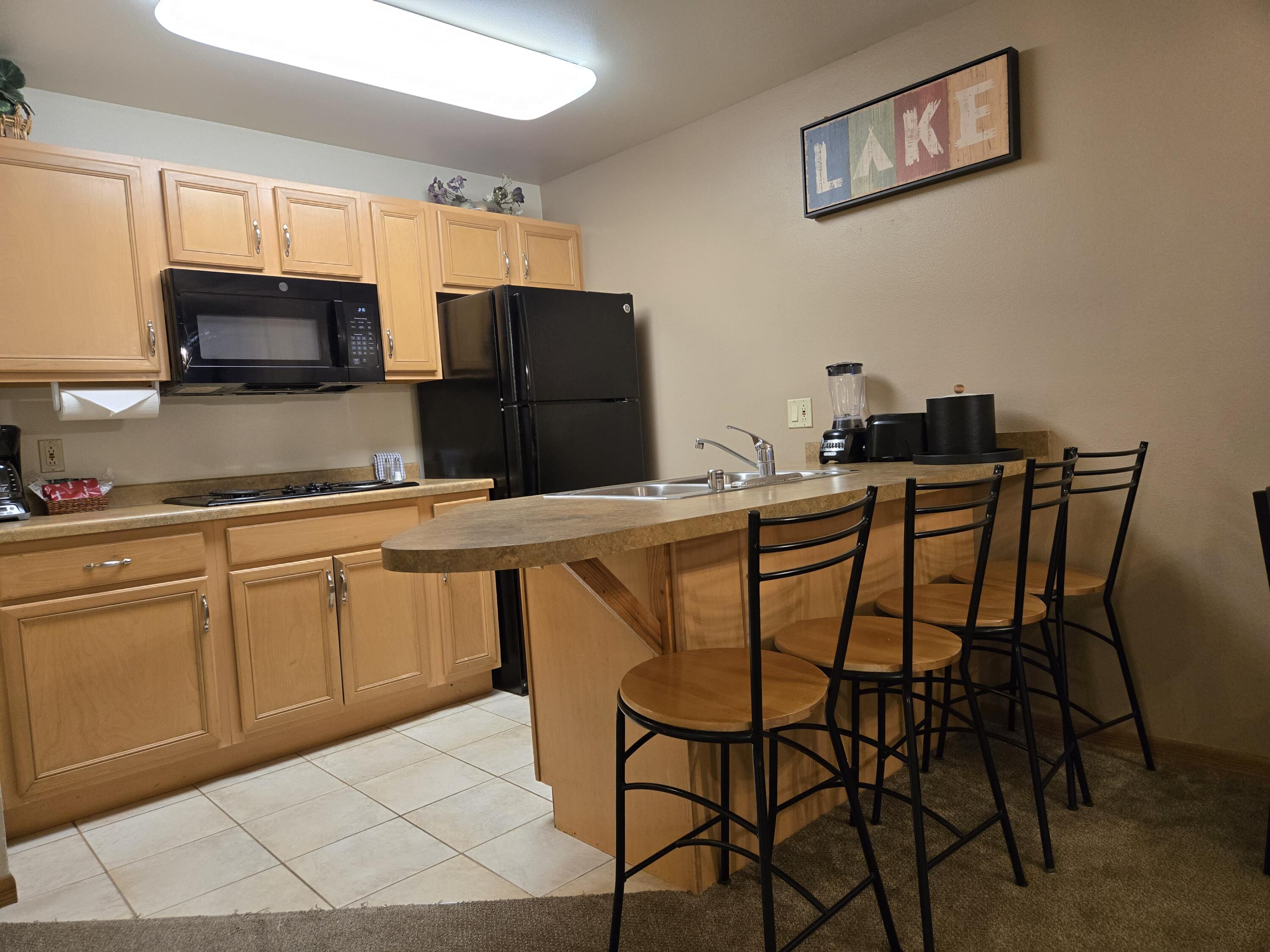 7020 Grand Geneva Way, Unit 361 Lyons, WI 53147 - Photo 9 of 29 4 Kitchen Bar Stools