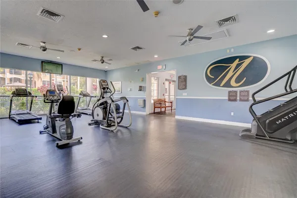 a view of a room with gym equipment